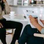 crop faceless multiethnic interviewer and job seeker going through interview