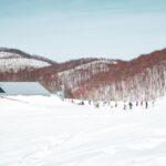 photo of people skiing on a slope