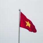 red and yellow flag close up photography