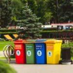 assorted color plastic trash bins